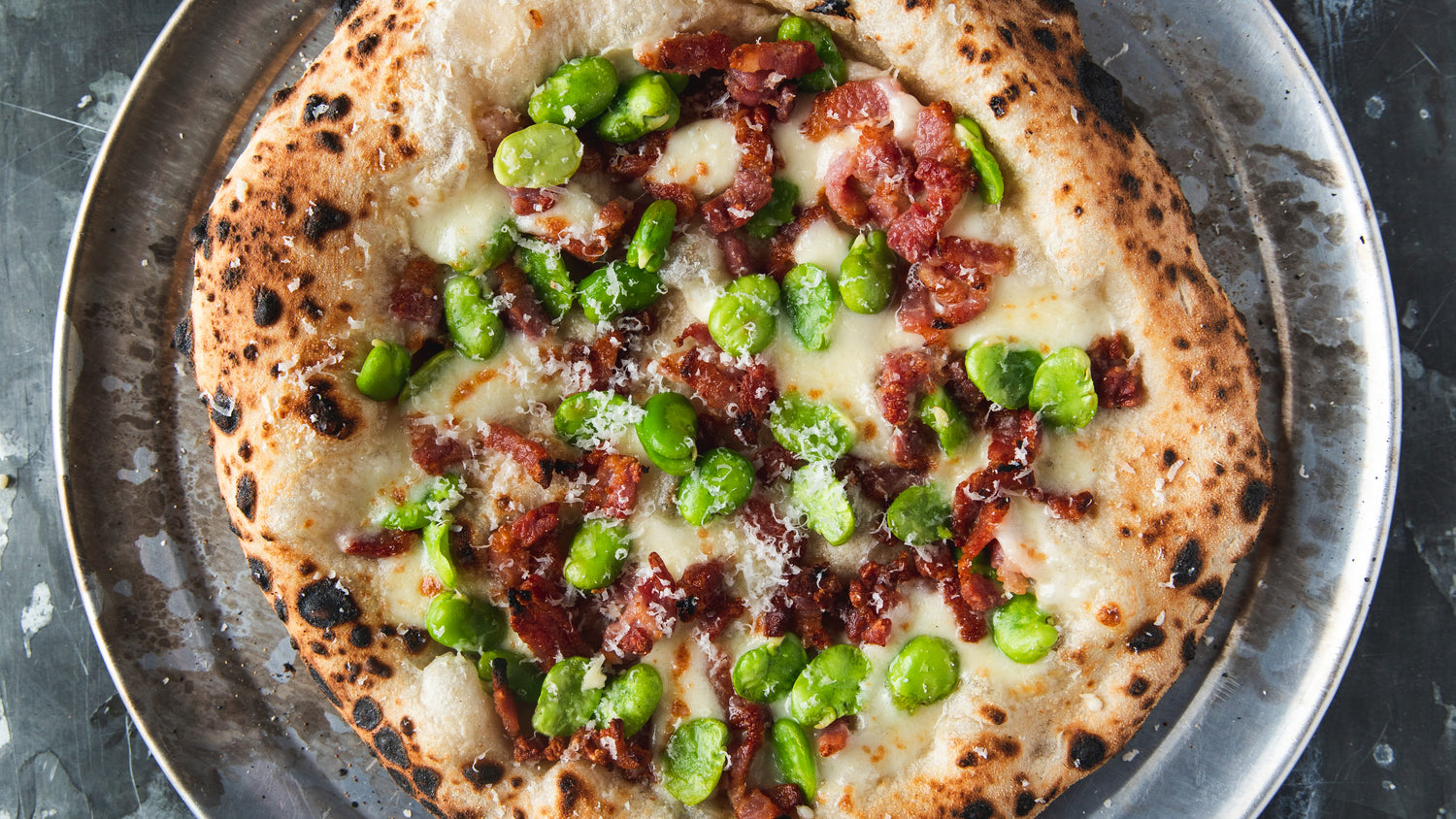 Fava Bean & Bacon Pizza with Lemon Oil - Roccbox recipe poster image
