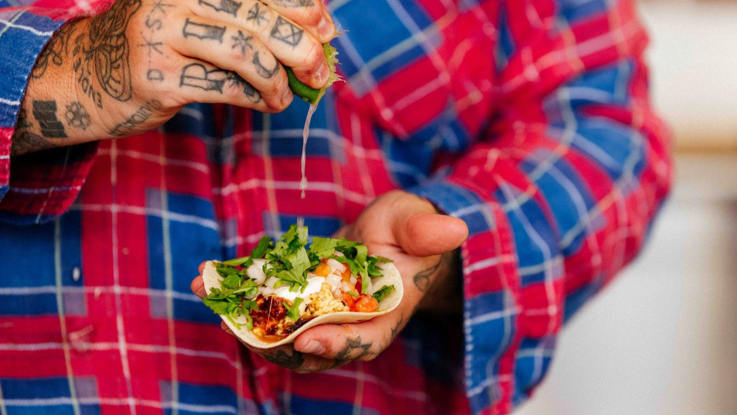 Shrimp Fajitas Taco getting a lime squeezed on it