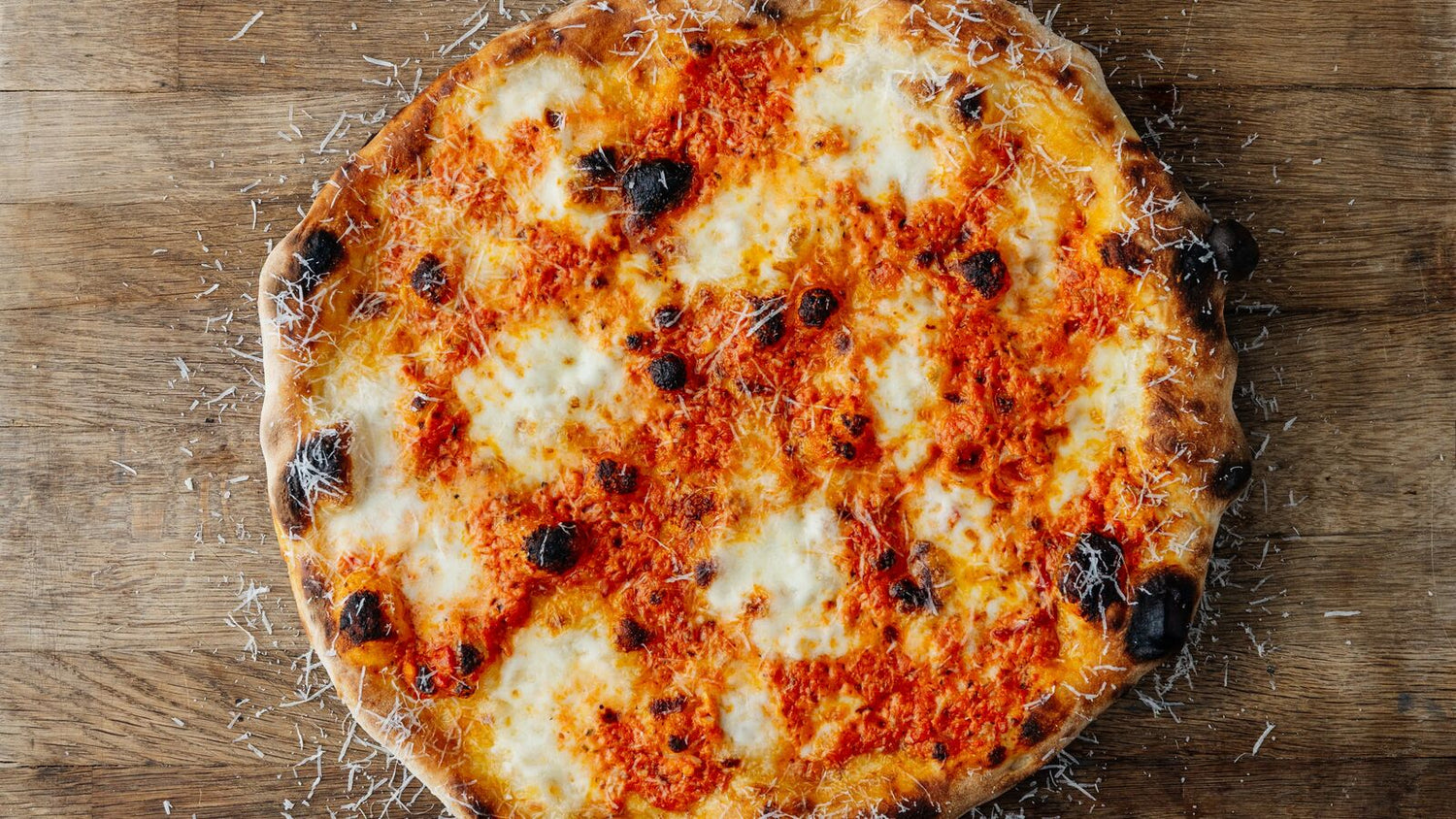 Vodka Pizza on a wooden board