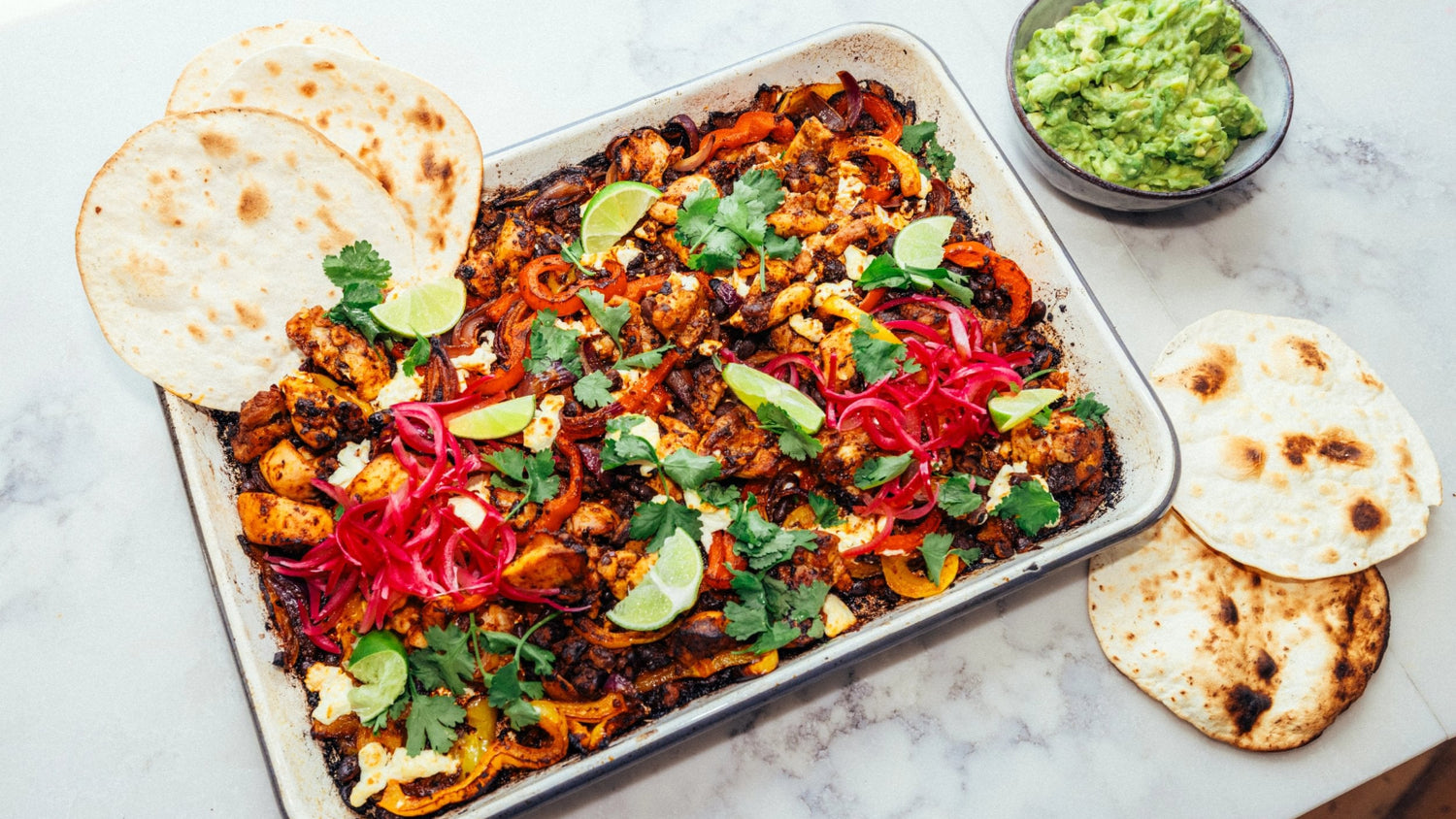 Sheet Pan Chicken Fajitas with Guacamole and Tortillas recipe poster image